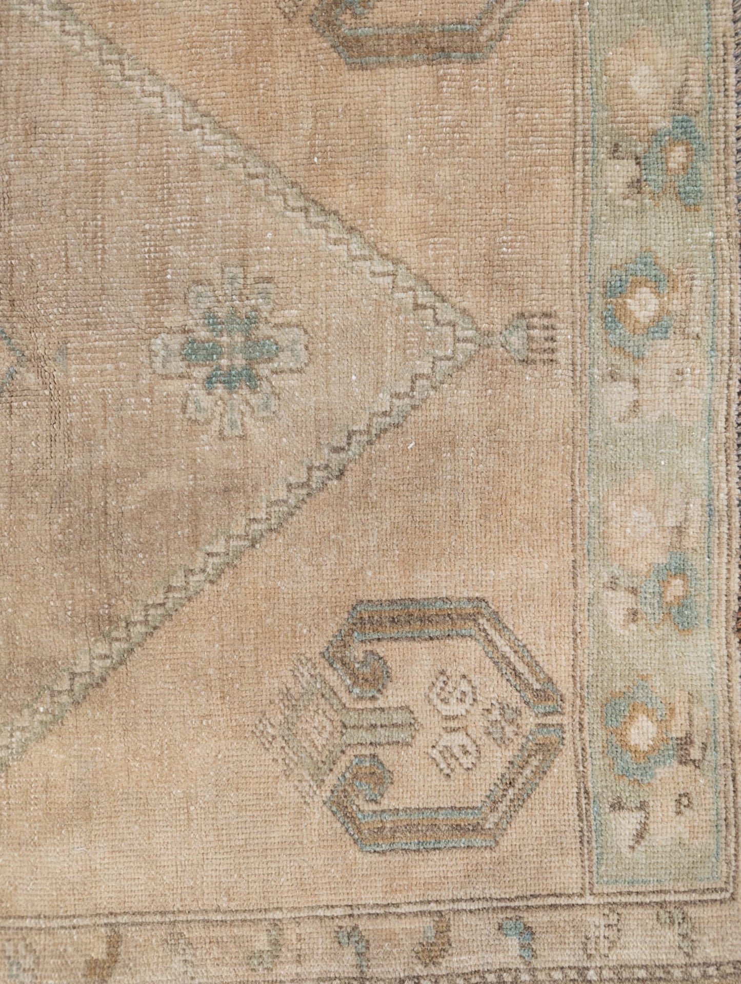 Faded Green and Gold Hallway Rug