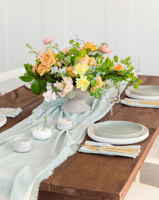 Handwoven cotton gauze table runner with fringed edges