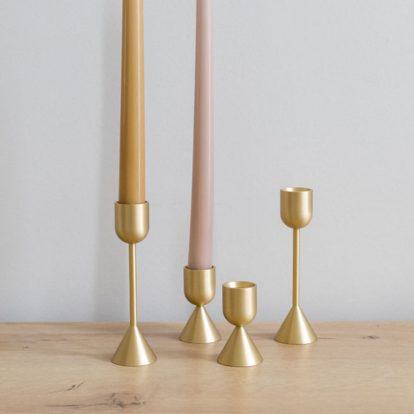 Minimalist and sleek brass taper candlestick holder for modern decor