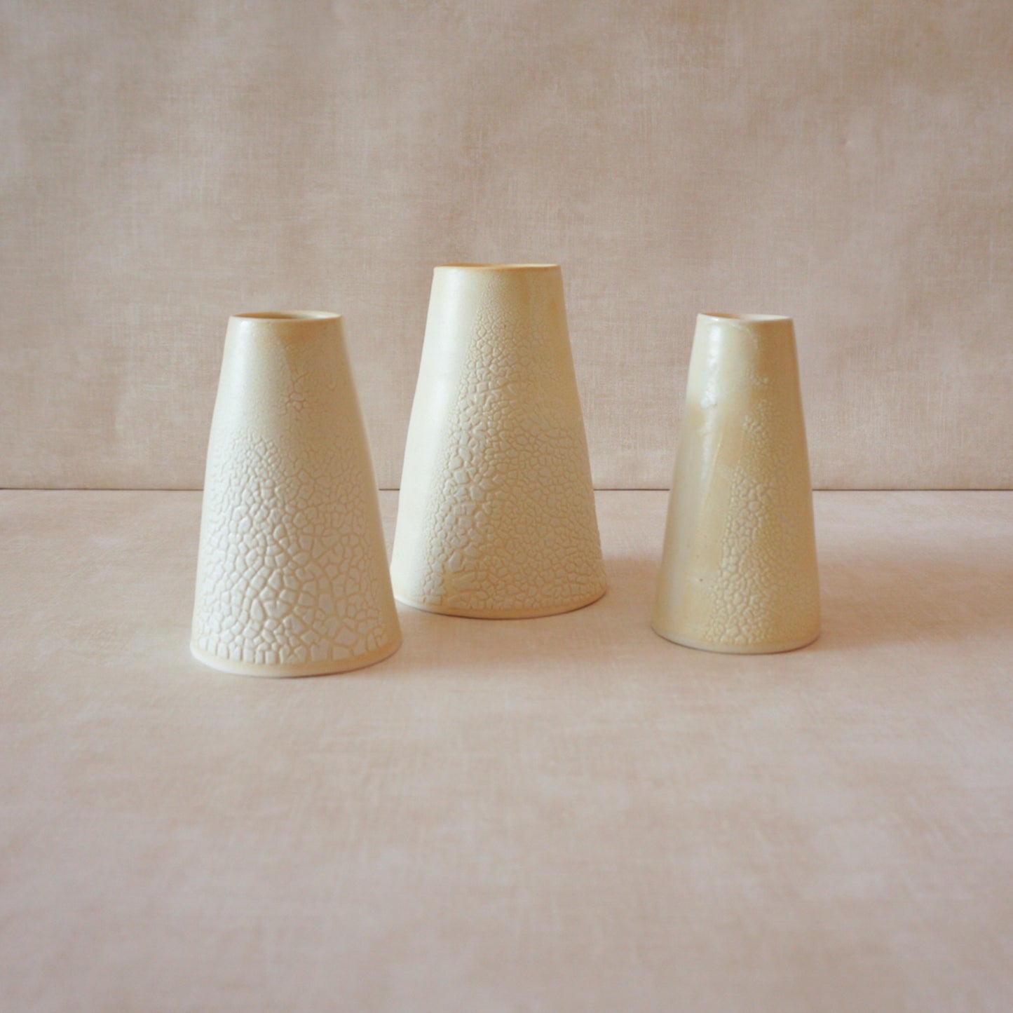 Handmade cone-shaped vase with unique texture and design