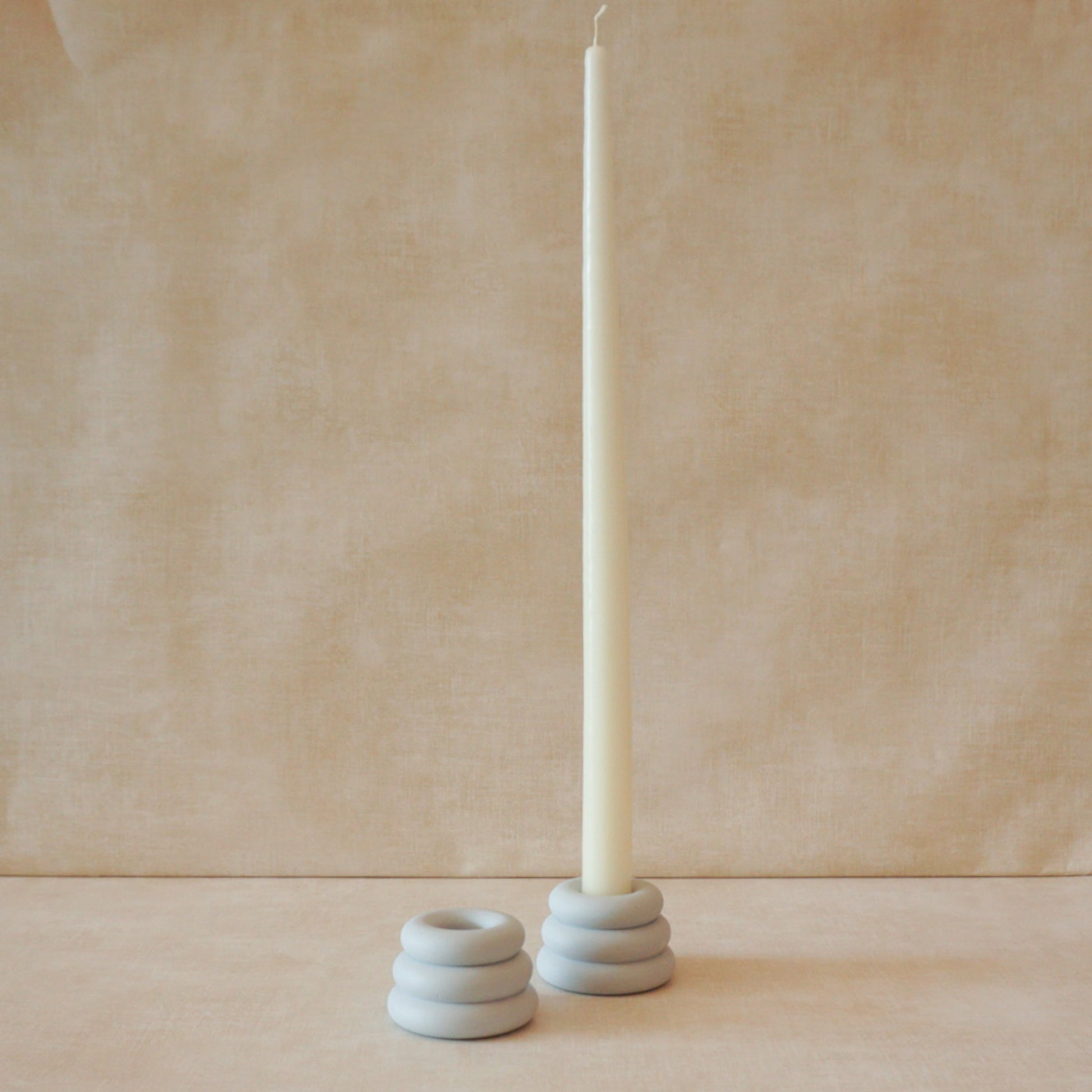 Sleek and contemporary candle holder with circular rings