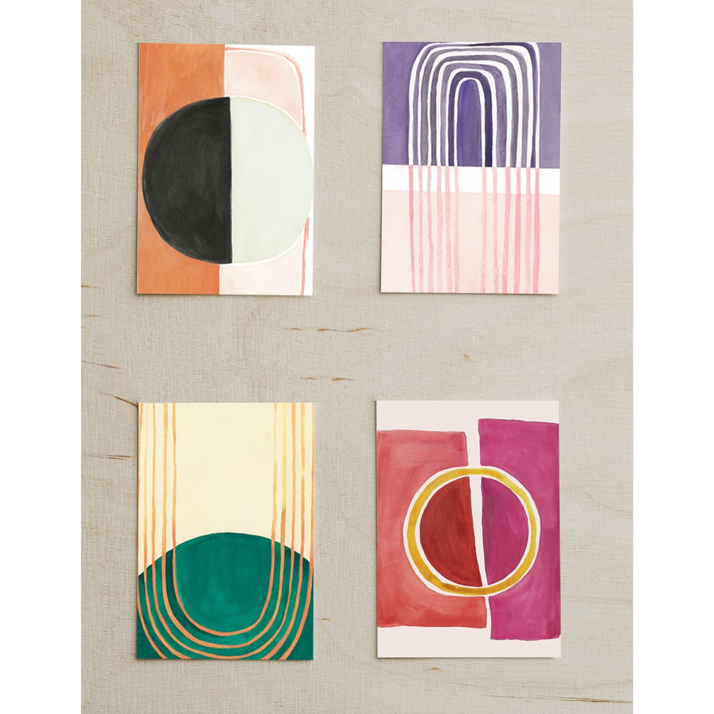 Set of 4 vibrant mid-century modern prints by Honora Papers, perfect for refreshing any home decor.