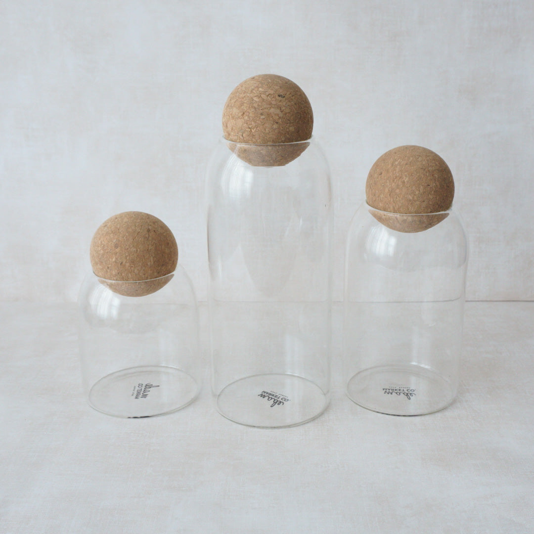 3 Glass storage cannisters with cork top