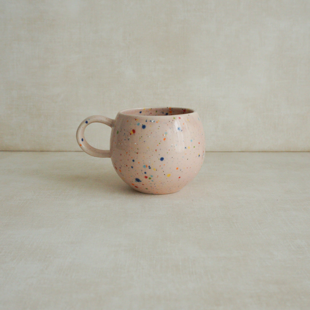 Pink confetti-patterned ceramic mug