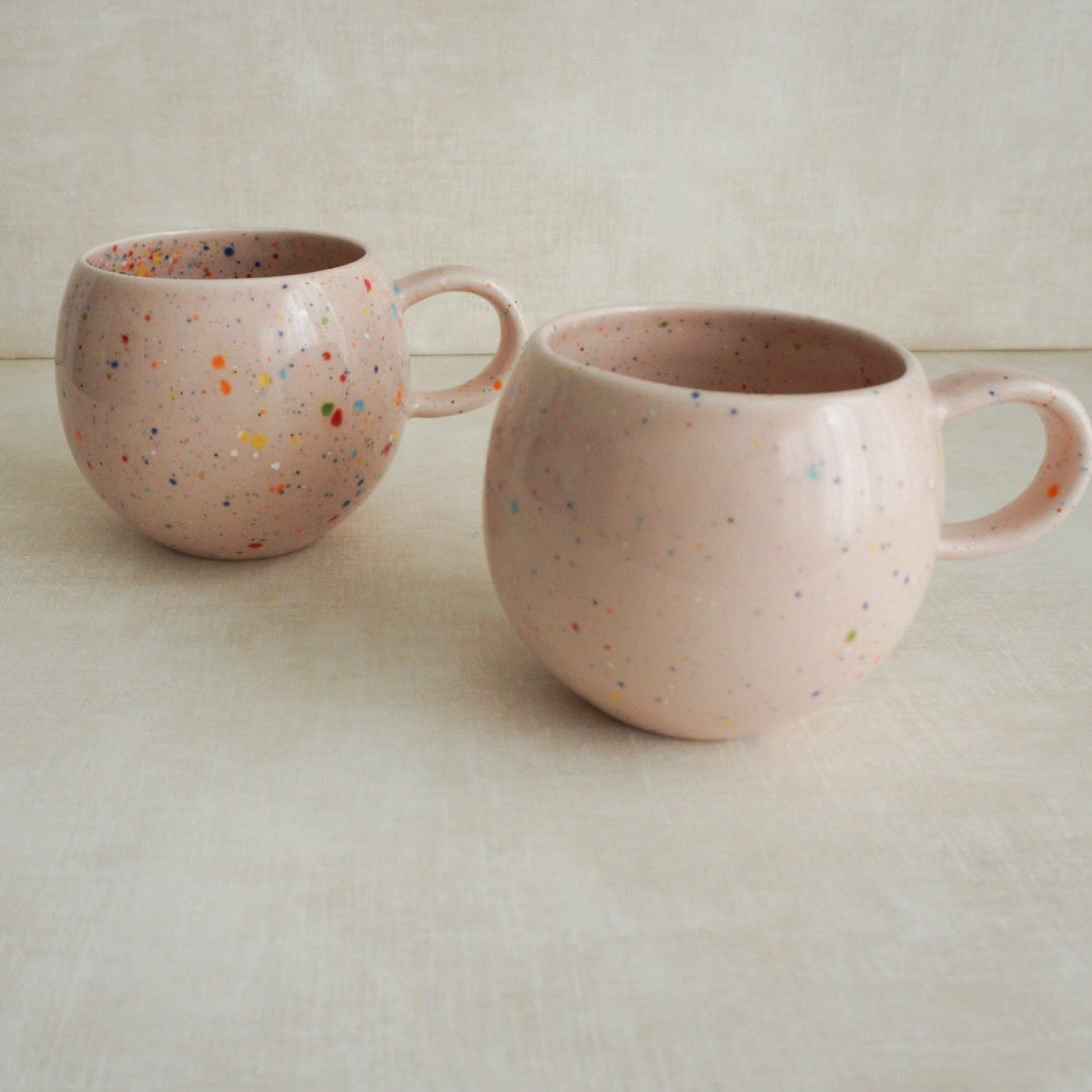 Playful and stylish pink confetti mug